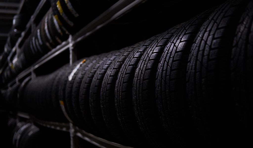 dark-storage-full-big-variety-new-tyres-busy-warehouse